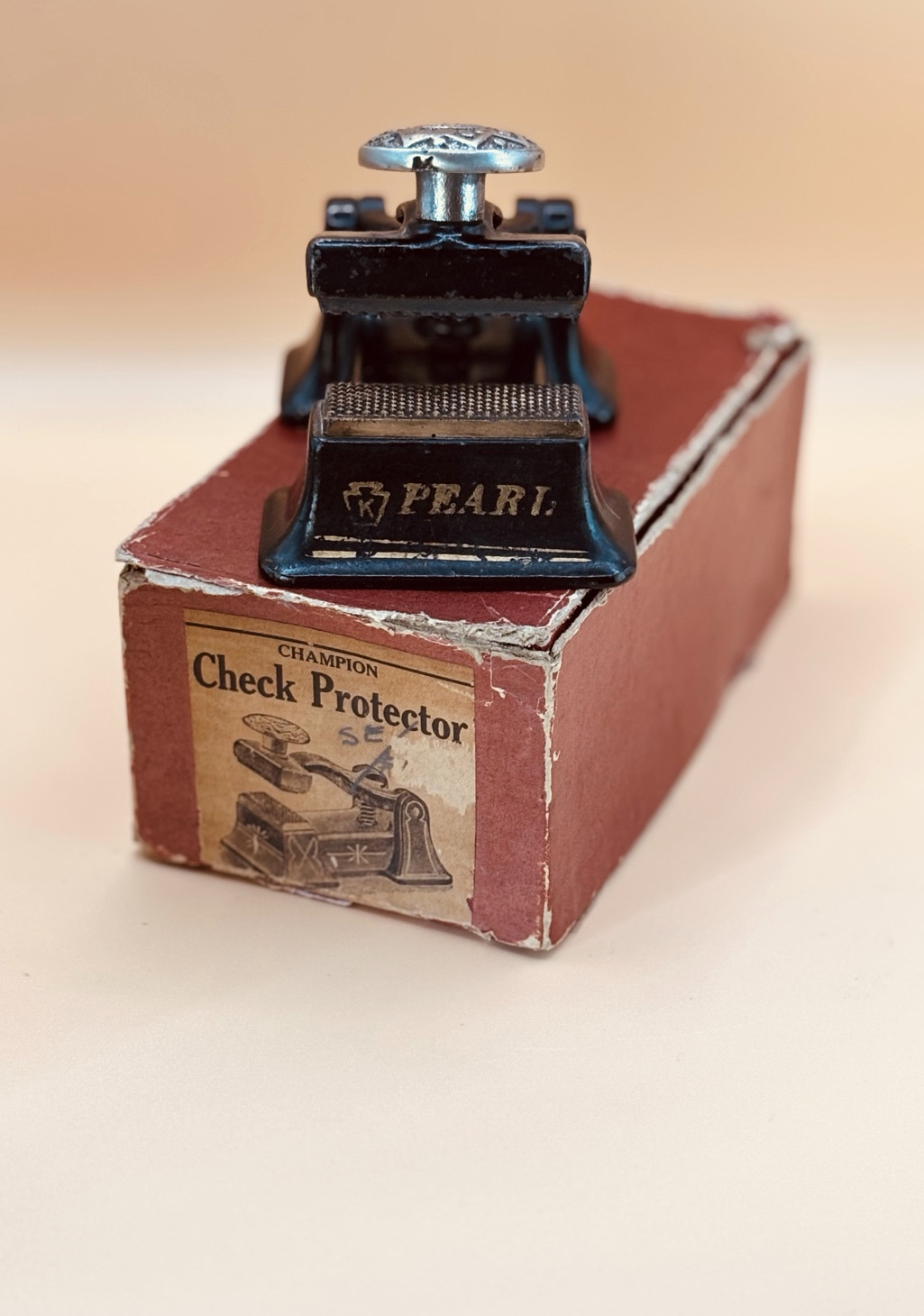 Pearl Check Protector amb la caixa Champion